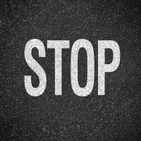 Road Marking 1.21 Inscription "Stop"